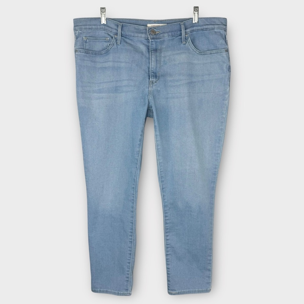 Levi’s slimming skinny jeans 34 mid-rise stretch denim light wash dressy EUC